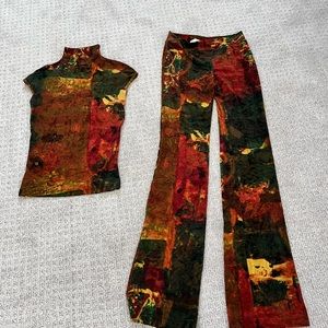 Plain Sud velour pants and sleeveless mock neck top.